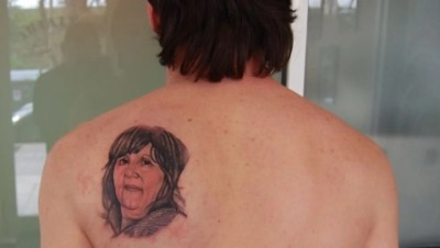 Lionel Messi has tattoo of his mother on his shoulder.